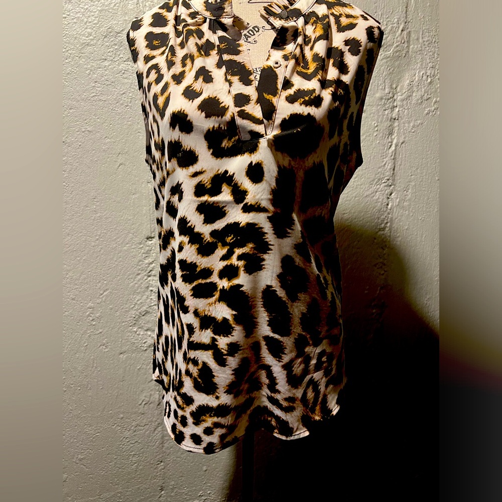 Calvin Klein leopard print blouse in mint condition